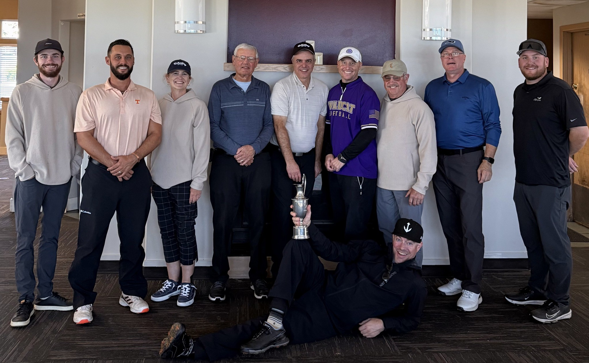 The winning Vice President’s Team celebrating with the President’s Cup
